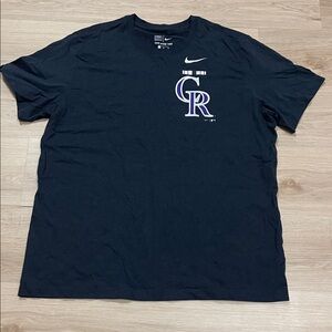 Nike Men's Black Tee with Purple Graphic
